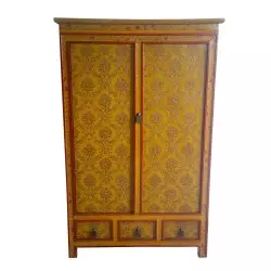 Armoire tibétaine jaune motifs floraux